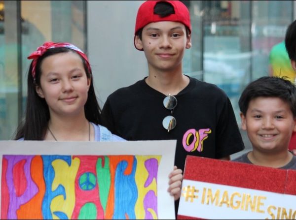 Young people from the Broadway community sing John Lennon's 'Imagine' for peace Photo
